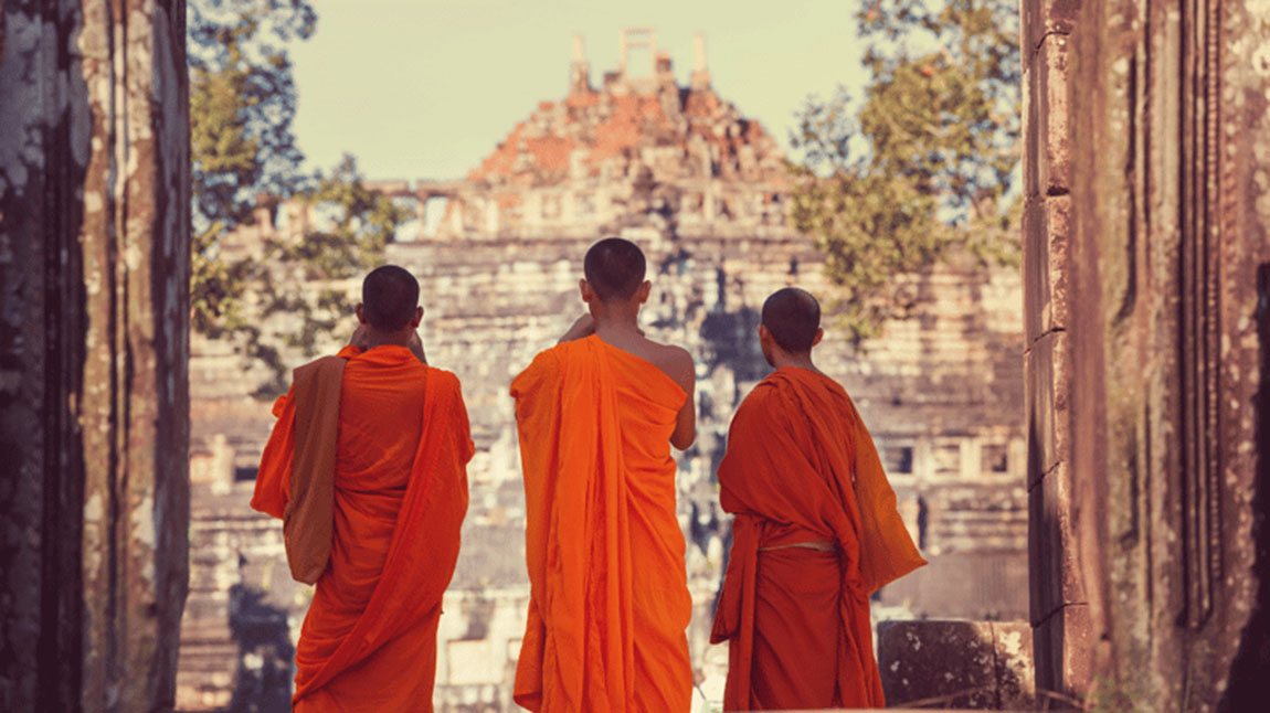 Monks at Baphuon Temple